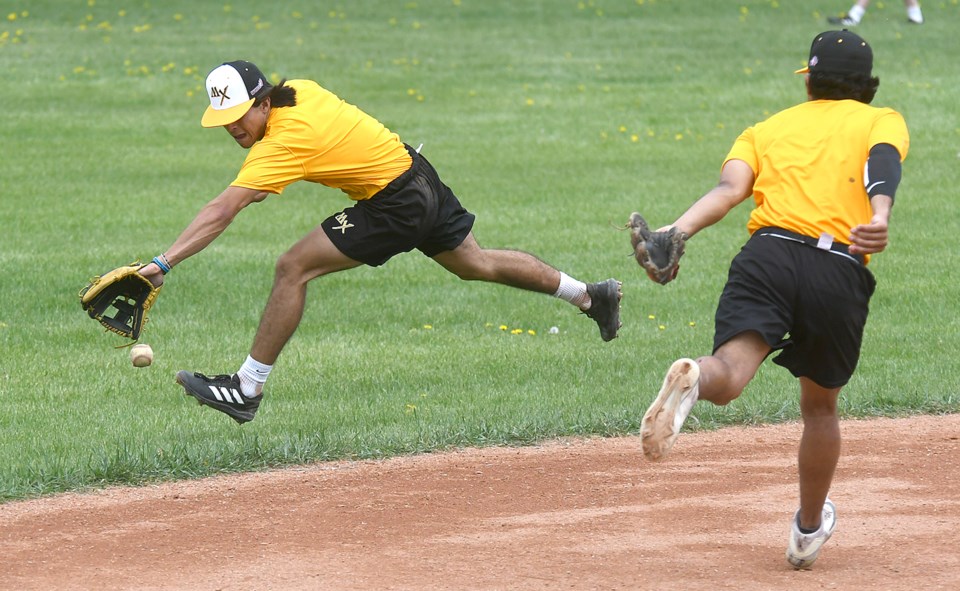 Miller Express infielder Thomas Soto hauls in a ground ball during batting practice on Thursday afternoon. Randy Palmer