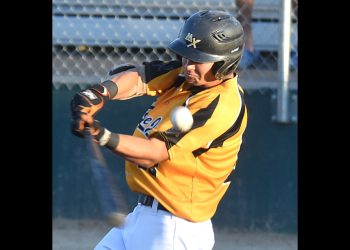 Dawson Tweet sends a pitch down the third baseline during second-inning action. Randy Palmer